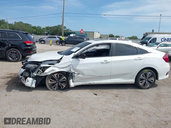 2018 Honda Civic EX-T z VIN 19XFC1F3XJE004123, wystawiony jako IAAI lot #42090933 z przebiegiem 81 228 mil mil oraz . Historia ofert i sprzedaży dostępna na DreamBid. Obrazek 14.