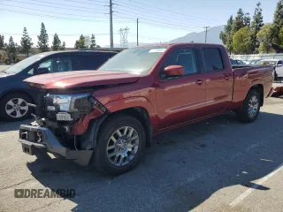 2022 Nissan Frontier SV with VIN 1N6ED1FJ9NN637623, listed as a Copart auction lot 57306685 with 23,446 mi miles and Salvage title. Bid and sale history available at DreamBid. Image 1.