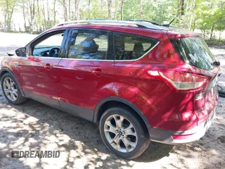 2014 Ford Escape Titanium with VIN 1FMCU9JX7EUB68165, listed as a IAAI auction lot 42141235 with 172,041 mi miles and . Bid and sale history available at DreamBid. Image 3.