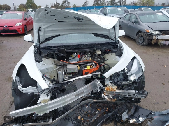 2023 Tesla Model 3 with VIN 5YJ3E1EA6PF432397, listed as a IAAI auction lot 41760895 with 15,692 mi miles and . Bid and sale history available at DreamBid. Image 13.
