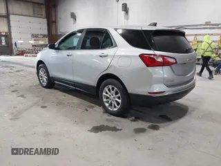 2021 Chevrolet Equinox LT z VIN 3GNAXUEV9MS140887, wystawiony jako IAAI lot #42246019 z przebiegiem 65 108 mil mil oraz . Historia ofert i sprzedaży dostępna na DreamBid. Obrazek 3.