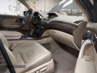 2010 Acura MDX Technology Pkg with VIN 2HNYD2H6XAH515333, listed as a IAAI auction lot 41834679 with 128,224 mi miles. Bid and sale history available at carsss.com. Image 5.