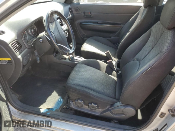 2007 Hyundai Accent SE z VIN KMHCN36C47U027122, wystawiony jako Copart lot #52224605 z przebiegiem 169 022 mil mil oraz Szkoda całkowita • Salvage title. Historia ofert i sprzedaży dostępna na DreamBid. Obrazek 7.