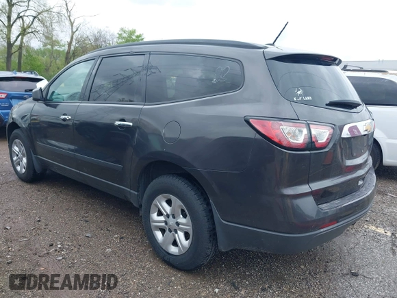 2015 Chevrolet Traverse LS z VIN 1GNKRFKDXFJ107942, wystawiony jako IAAI lot #42111246 z przebiegiem 128 036 mil mil oraz . Historia ofert i sprzedaży dostępna na DreamBid. Obrazek 3.