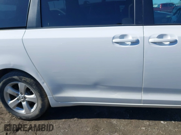 2013 Toyota Sienna LE AAS with VIN 5TDKK3DC2DS354582, listed as a IAAI auction lot 41360766 with 169,978 mi miles. Bid and sale history available at carsss.com. Image 6.