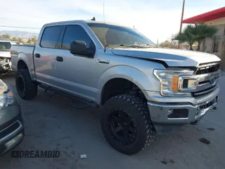2019 Ford F-150 XL with VIN 1FTEW1E43KKE23264, listed as a IAAI auction lot 41395865 with 106,898 mi miles. Bid and sale history available at carsss.com. Image 1.