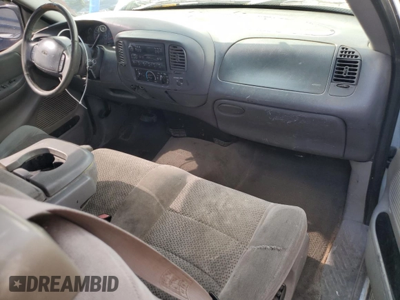 2002 Ford F-150 XL z VIN 1FTRX17W22NB22531, wystawiony jako Copart lot #54694475 z przebiegiem Nie podano mil oraz Szkoda całkowita • Salvage title. Historia ofert i sprzedaży dostępna na DreamBid. Obrazek 8.