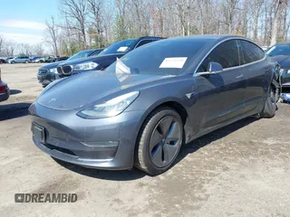 2018 Tesla Model 3 Long Range Battery z VIN 5YJ3E1EB1JF093175, wystawiony jako IAAI lot #41766128 z przebiegiem Nie podano mil oraz . Historia ofert i sprzedaży dostępna na DreamBid. Obrazek 16.
