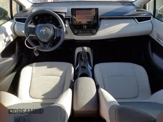 2021 Toyota Corolla Hybrid LE with VIN JTDEAMDE2MJ021576, listed as a Copart auction lot 49916105 with 24,292 mi miles and Salvage Title. Bid and sale history available at carsss.com. Image 8.