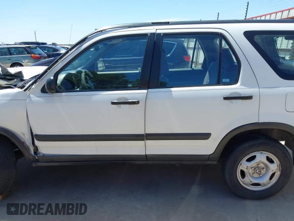 2003 Honda CR-V LX z VIN JHLRD68403C017375, wystawiony jako IAAI lot #42237124 z przebiegiem 172 054 mil mil oraz . Historia ofert i sprzedaży dostępna na DreamBid. Obrazek 14.