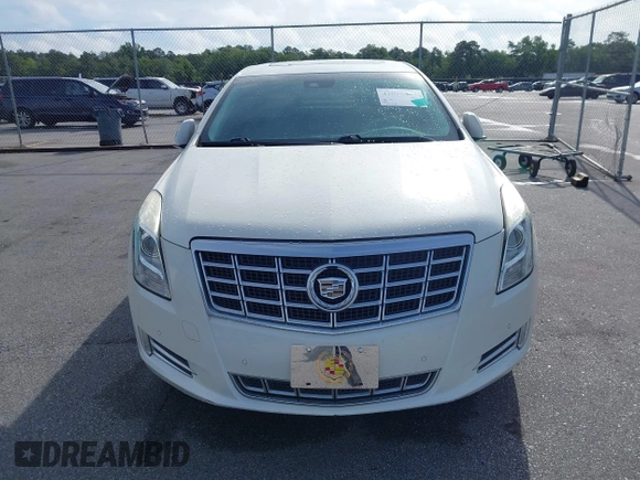 2013 Cadillac XTS Premium z VIN 2G61S5S35D9103948, wystawiony jako IAAI lot #42090444 z przebiegiem 154 728 mil mil oraz . Historia ofert i sprzedaży dostępna na DreamBid. Obrazek 6.