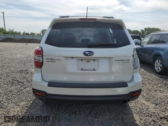 2014 Subaru Forester Touring с VIN JF2SJAPC5EH497987, выставлен на аукционе Copart как лот 60756495 с пробегом 66 060 миль миль и Списание • Salvage title. История ставок и продаж доступна на DreamBid. Изображение 6.