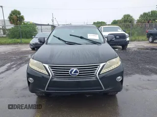 2013 Lexus RX 450h with VIN JTJZB1BA3D2006802, listed as a IAAI auction lot 42720067 with 117,291 mi miles and . Bid and sale history available at DreamBid. Image 12.
