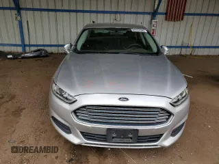 2013 Ford Fusion SE Hybrid z VIN 3FA6P0LU2DR104182, wystawiony jako Copart lot #63107545 z przebiegiem 249 317 mil mil oraz Szkoda całkowita • Salvage title. Historia ofert i sprzedaży dostępna na DreamBid. Obrazek 5.