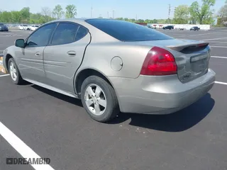 2007 Pontiac Grand Prix with VIN 2G2WP552971151953, listed as a IAAI auction lot 41996318 with 323,690 mi miles. Bid and sale history available at carsss.com. Image 3.