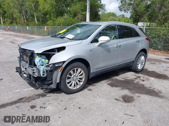 2019 Cadillac XT5 FWD z VIN 1GYKNARSXKZ242727, wystawiony jako IAAI lot #41669220 z przebiegiem 62 812 mil mil oraz . Historia ofert i sprzedaży dostępna na DreamBid. Obrazek 17.