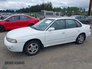 1996 Subaru Legacy with VIN 4S3BD4559T7202906, listed as a IAAI auction lot 42214410 with 211,118 mi miles and . Bid and sale history available at DreamBid. Image 2.