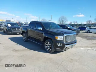 2019 GMC Canyon 4WD Denali with VIN 1GTG6EEN5K1135003, listed as a IAAI auction lot 41599314 with 108,087 mi miles. Bid and sale history available at carsss.com. Image 1.