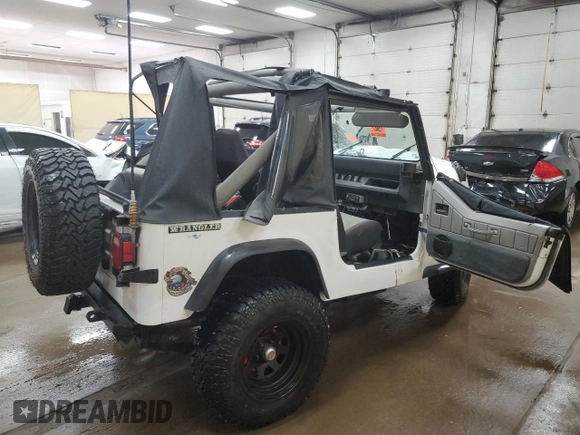 1990 Jeep Wrangler S with VIN 2J4FY19E8LJ541713, listed as a Copart auction lot 60809655 with 134,077 mi miles and Clean title. Bid and sale history available at DreamBid. Image 10.