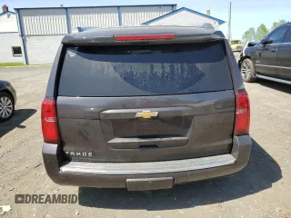2015 Chevrolet Tahoe LTZ z VIN 1GNSKCKC4FR607574, wystawiony jako Copart lot #54602085 z przebiegiem 125 923 mil mil oraz Szkoda całkowita • Salvage title. Historia ofert i sprzedaży dostępna na DreamBid. Obrazek 6.