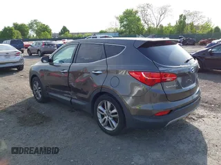 2013 Hyundai Santa Fe Sport z VIN 5XYZW3LA3DG068434, wystawiony jako IAAI lot #42167040 z przebiegiem 140 928 mil mil oraz . Historia ofert i sprzedaży dostępna na DreamBid. Obrazek 3.