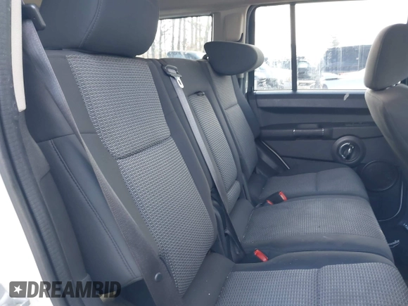 2010 Jeep Commander Sport with VIN 1J4RH4GK1AC122505, listed as a IAAI auction lot 41222229 with 244,001 mi miles and . Bid and sale history available at DreamBid. Image 8.