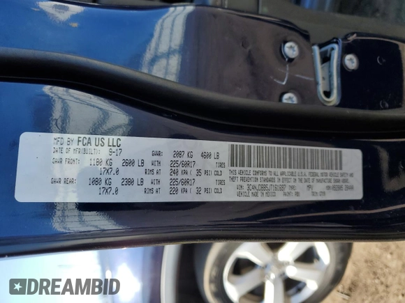 2018 Jeep Compass Latitude with VIN 3C4NJDBB5JT161697, listed as a Copart auction lot 52482895 with 60,631 mi miles and Salvage Title. Bid and sale history available at DreamBid. Image 14.