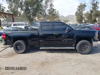 2014 Chevrolet Silverado 1500 LT with VIN 1GCVKREC7EZ417660, listed as a IAAI auction lot 41993599 with 137,025 mi miles and . Bid and sale history available at DreamBid. Image 13.