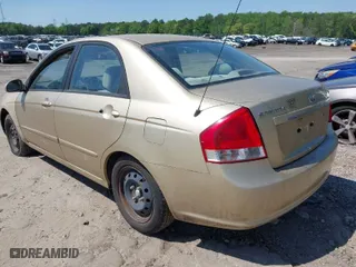 2009 Kia Spectra EX with VIN KNAFE222495653112, listed as a IAAI auction lot 41998808 with 59,187 mi miles. Bid and sale history available at carsss.com. Image 3.