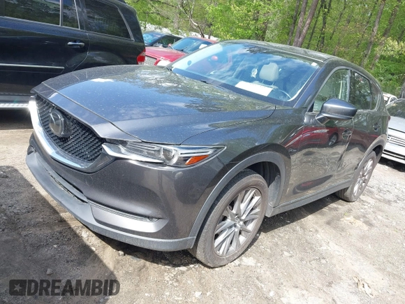 2019 Mazda CX-5 Grand Touring with VIN JM3KFBDM7K0619379, listed as a IAAI auction lot 42007107 with 209,590 mi miles. Bid and sale history available at carsss.com. Image 21.