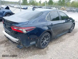 2021 Toyota Camry SE Nightshade with VIN 4T1G11AK5MU543890, listed as a IAAI auction lot 41904367 with 58,787 mi miles. Bid and sale history available at carsss.com. Image 4.
