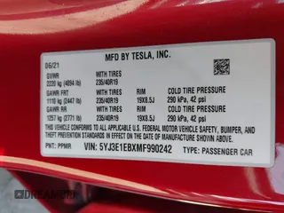 2021 Tesla Model 3 Long Range with VIN 5YJ3E1EBXMF990242, listed as a IAAI auction lot 41674222 with 24,554 mi miles and . Bid and sale history available at DreamBid. Image 9.