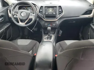 2014 Jeep Cherokee Sport with VIN 1C4PJLAB9EW149217, listed as a Copart auction lot 45353585 with 167,516 mi miles and Salvage Title. Bid and sale history available at DreamBid. Image 8.