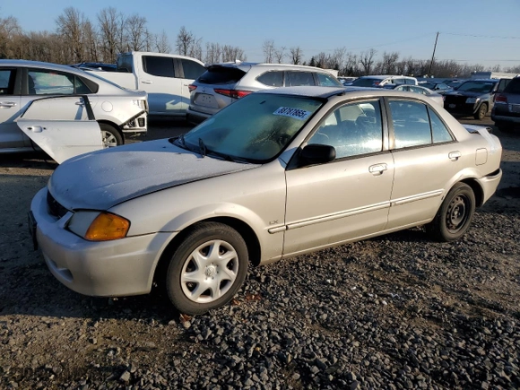 2000 Mazda Protege DX with VIN JM1BJ2225Y0240057, listed as a Copart auction lot 88787865 with 0 mi miles and Salvage Title. Bid and sale history available at carsss.com. Image 1.