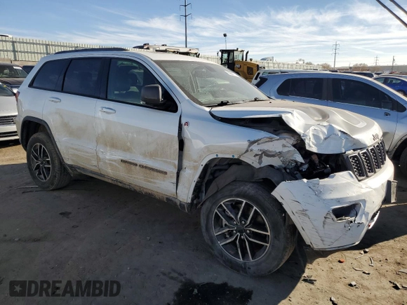 2021 Jeep Grand Cherokee Trailhawk with VIN 1C4RJFLG3MC646573, listed as a Copart auction lot 82687014 with 83,294 mi miles and Salvage Title. Bid and sale history available at carsss.com. Image 4.