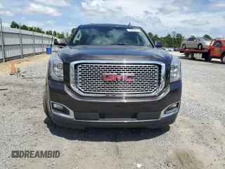 2017 GMC Yukon Denali with VIN 1GKS2CKJ3HR360319, listed as a Copart auction lot 70051014 with 127,896 mi miles and Salvage Title. Bid and sale history available at carsss.com. Image 5.