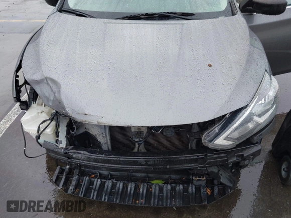 2018 Nissan Sentra S with VIN 3N1AB7AP0JY244535, listed as a IAAI auction lot 41573436 with 150,919 mi miles and . Bid and sale history available at DreamBid. Image 6.