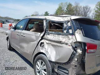 2017 Kia Sedona LX with VIN KNDMB5C14H6233059, listed as a IAAI auction lot 42006480 with 109,748 mi miles. Bid and sale history available at carsss.com. Image 6.