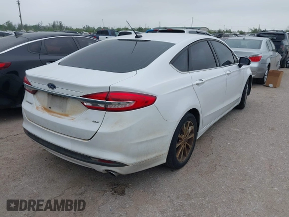 2017 Ford Fusion SE with VIN 3FA6P0H79HR149533, listed as a IAAI auction lot 41886152 with 119,049 mi miles. Bid and sale history available at carsss.com. Image 4.