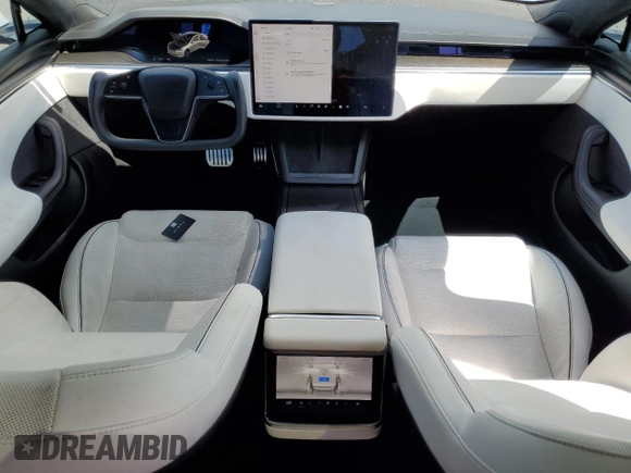 2021 Tesla Model S Plaid с VIN 5YJSA1E66MF453717, выставлен на аукционе Copart как лот 49330355 с пробегом 64 458 миль миль и Списание • Salvage title. История ставок и продаж доступна на DreamBid. Изображение 8.