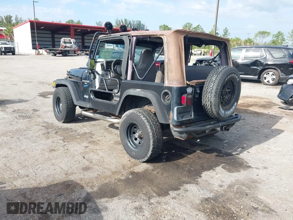 1997 Jeep Wrangler Sport with VIN 1J4FY19S5VP539283, listed as a IAAI auction lot 41996476 with 131,593 mi miles and . Bid and sale history available at DreamBid. Image 3.