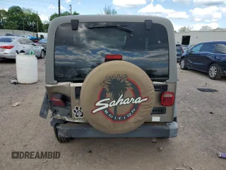 2004 Jeep Wrangler Sahara with VIN 1J4FA59SX4P791038, listed as a Copart auction lot 56154455 with 193,693 mi miles and Salvage title. Bid and sale history available at DreamBid. Image 6.