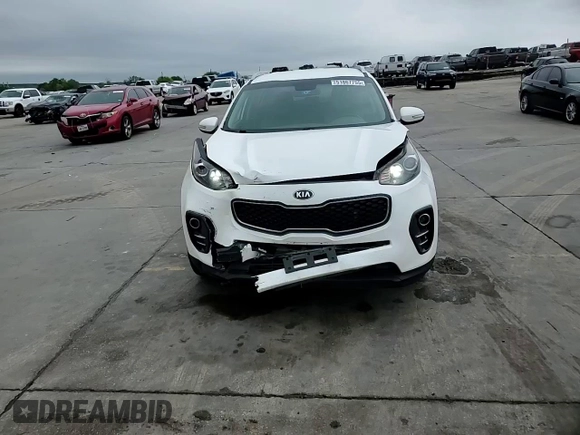 2019 Kia Sportage EX z VIN KNDPN3AC0K7559133, wystawiony jako Copart lot #51867755 z przebiegiem 64 867 mil mil oraz Szkoda całkowita • Salvage title. Historia ofert i sprzedaży dostępna na DreamBid. Obrazek 11.
