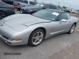 2004 Chevrolet Corvette with VIN 1G1YY22G645132408, listed as a IAAI auction lot 42110641 with 32,707 mi miles and . Bid and sale history available at DreamBid. Image 2.