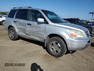 2003 Honda Pilot EX z VIN 2HKYF18633H607078, wystawiony jako Copart lot #51830565 z przebiegiem 197 338 mil mil oraz Szkoda całkowita • Salvage title. Historia ofert i sprzedaży dostępna na DreamBid. Obrazek 4.