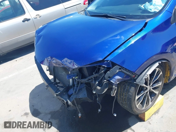 2017 Toyota Corolla L with VIN 2T1BURHE5HC767992, listed as a IAAI auction lot 42196966 with 95,274 mi miles and . Bid and sale history available at DreamBid. Image 6.