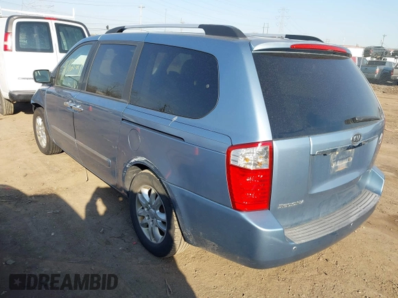 2010 Kia Sedona EX with VIN KNDMH4C38A6334878, listed as a IAAI auction lot 41772024 with 208,818 mi miles. Bid and sale history available at carsss.com. Image 3.