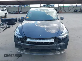 2023 Tesla Model Y Long Range with VIN 7SAYGDEEXPA078629, listed as a IAAI auction lot 42046354 with 27,245 mi miles and . Bid and sale history available at DreamBid. Image 13.