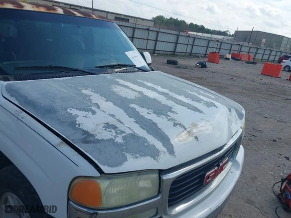 2004 GMC Yukon SLT with VIN 1GKEC13V14J273866, listed as a IAAI auction lot 41512337 with 252,702 mi miles. Bid and sale history available at carsss.com. Image 6.