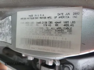 2002 Mitsubishi Galant ES z VIN 4A3AA46G32E158168, wystawiony jako Copart lot #74522324 z przebiegiem 179 981 mil mil oraz Szkoda całkowita • Salvage title. Historia ofert i sprzedaży dostępna na DreamBid. Obrazek 13.